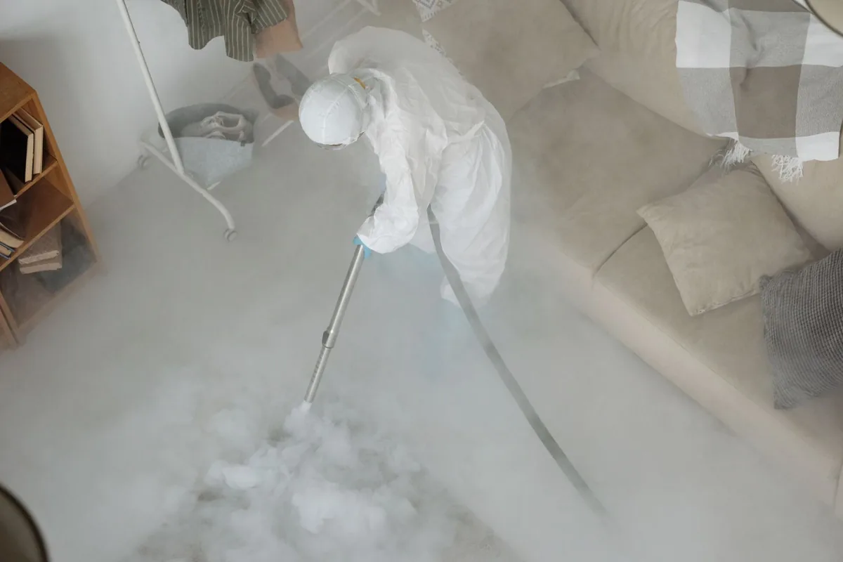 Biohazard cleanup technician in protective equipment, Mamaroneck, NY